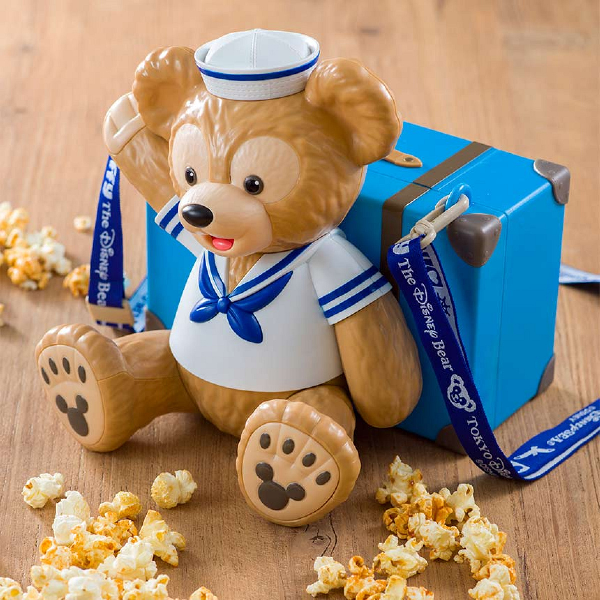 青いトランクケースデザインのポップコーンバケット| キャステル