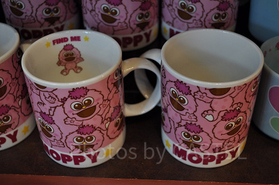 モッピーの総柄マグカップ